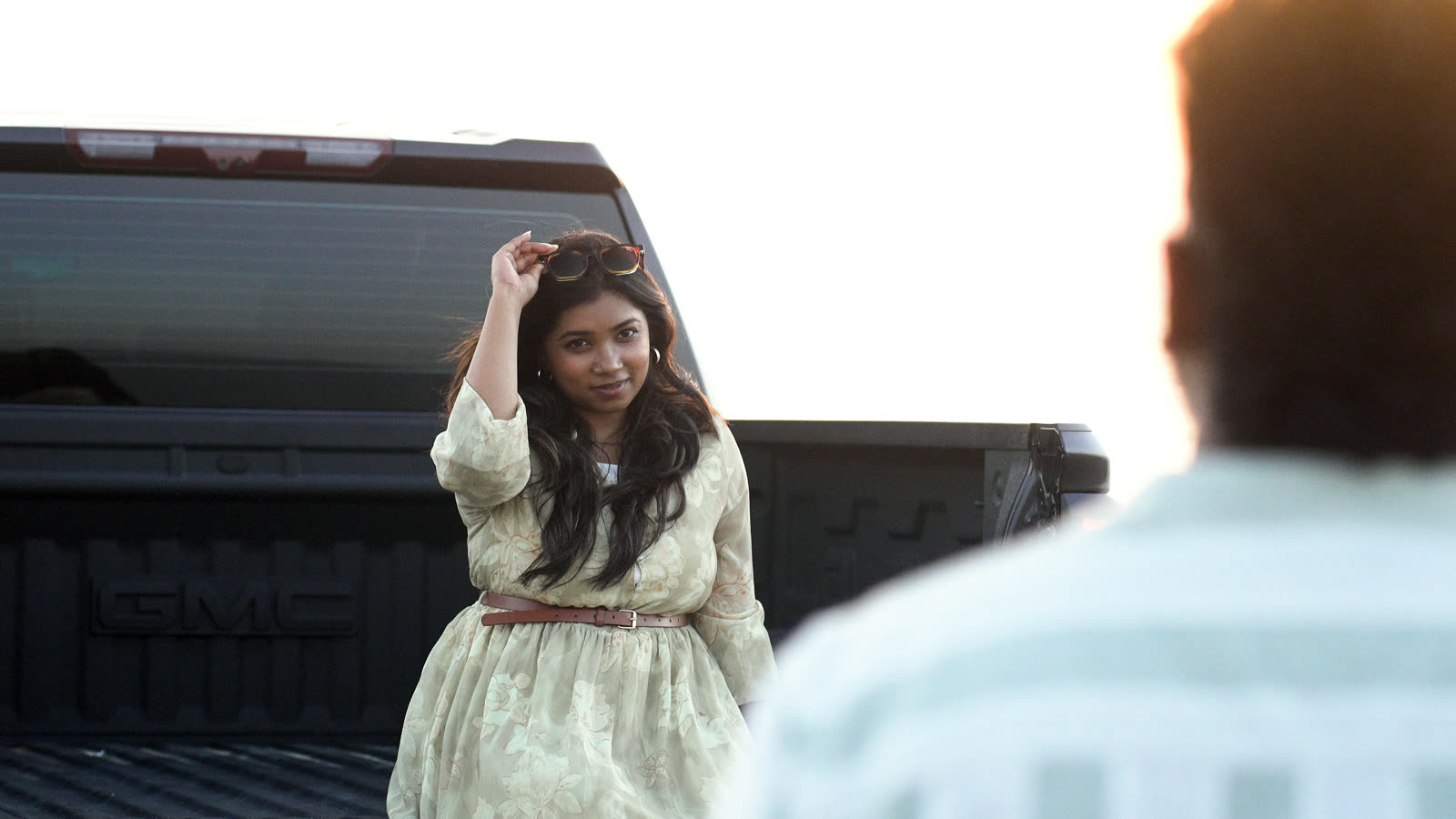 Vibha smiling by the truck